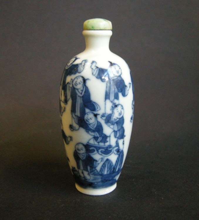 Porcelain snuff bottle blue and white decorated with childrens games
